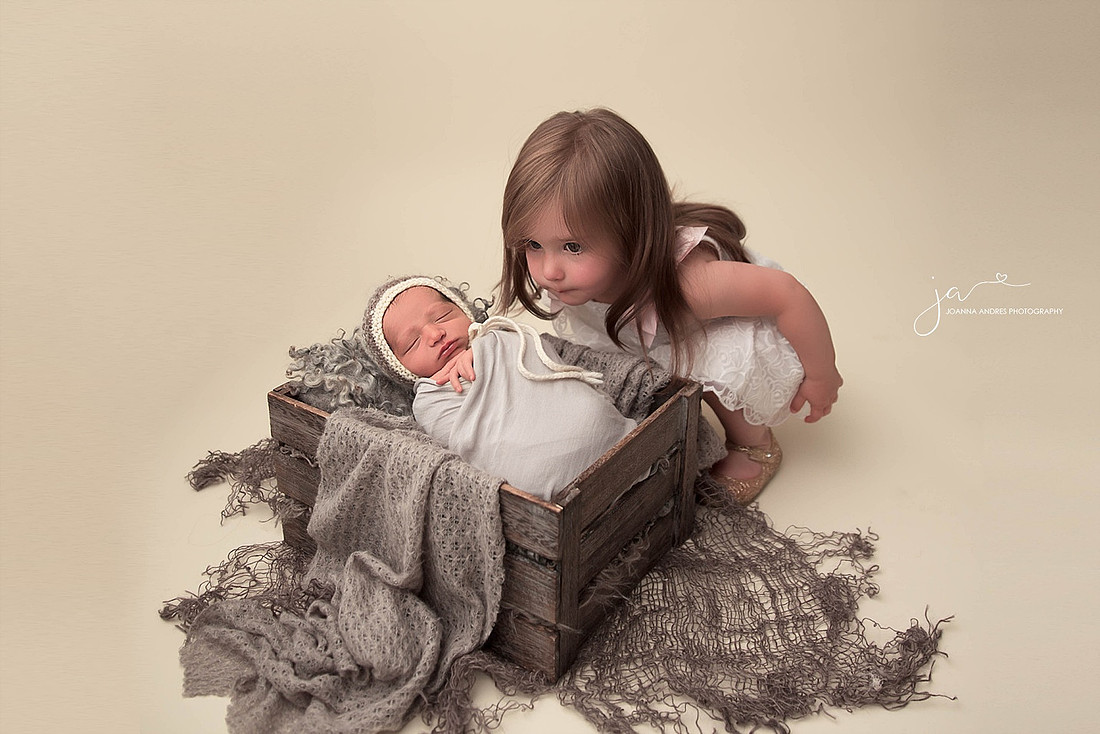 Sibling Image with Newborn and Big Sister