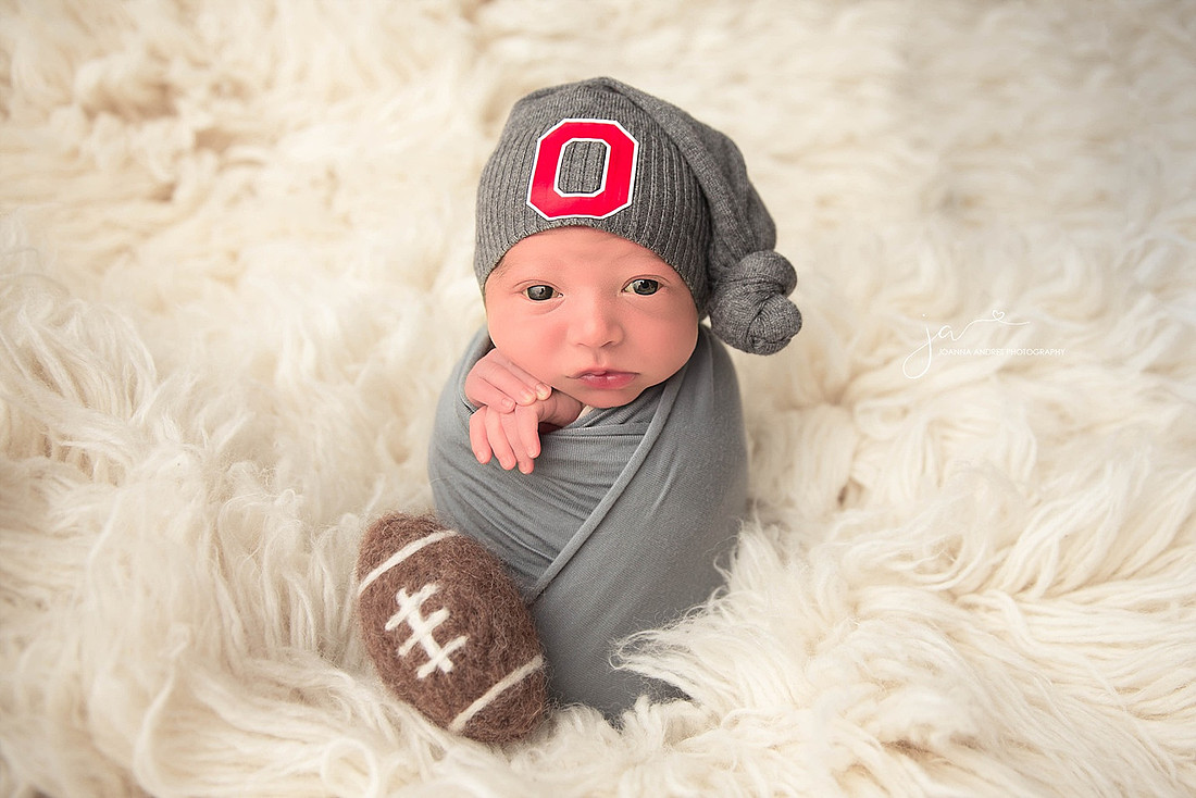 Baby Boy in OSU hat wide eyed