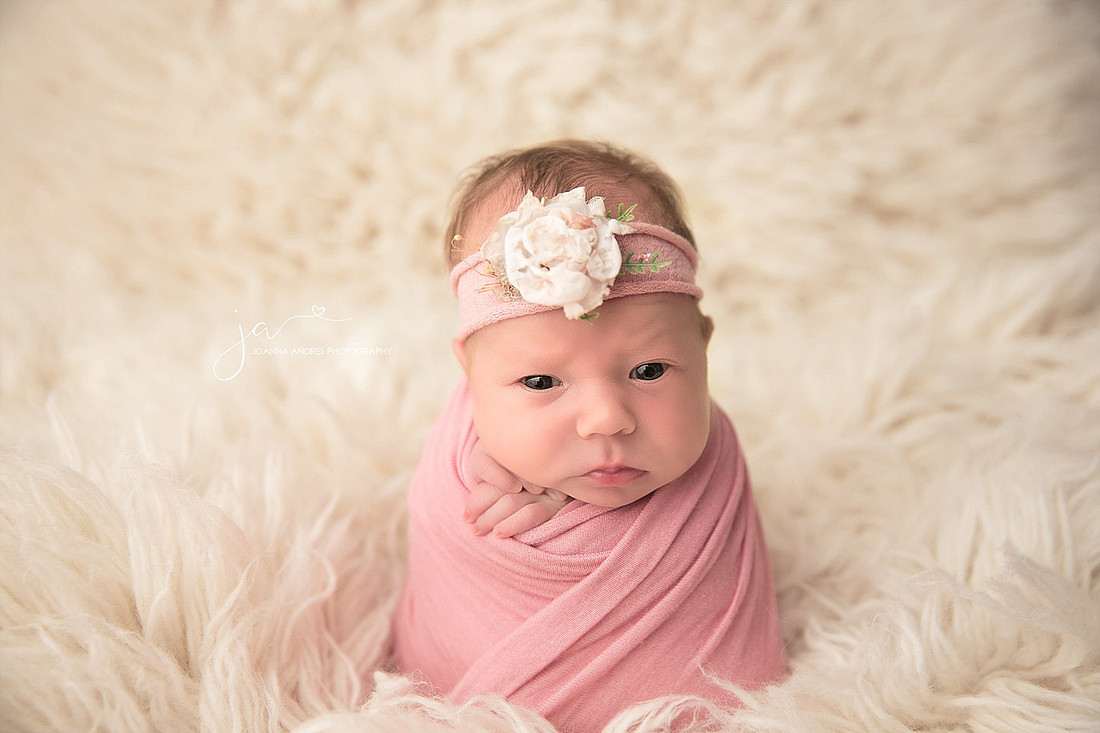 Baby Girl Wrapped in Pinks and Whites