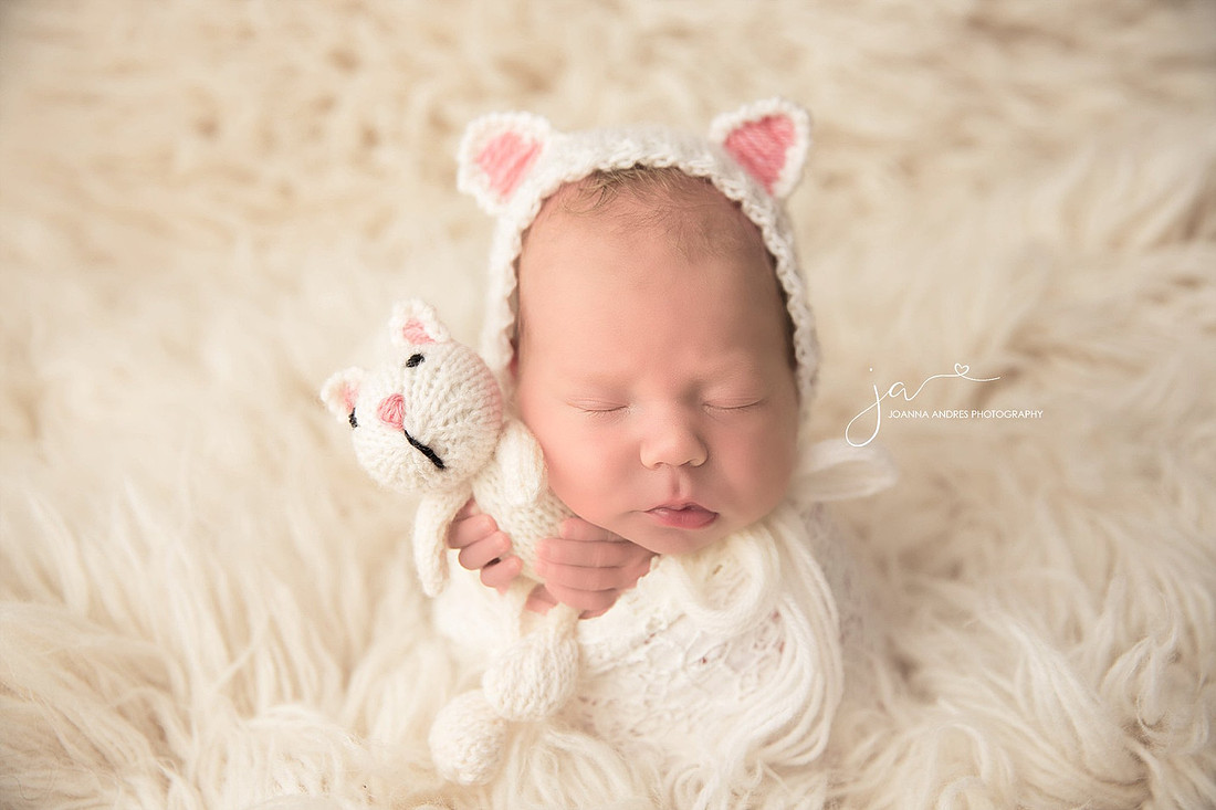 Baby Girl wrapped in Whites with Kitten Hat