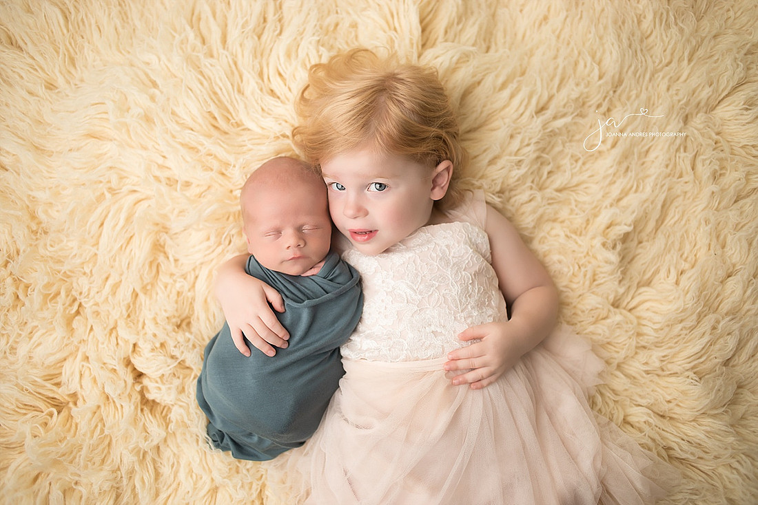 SIbling with Newborn Boy