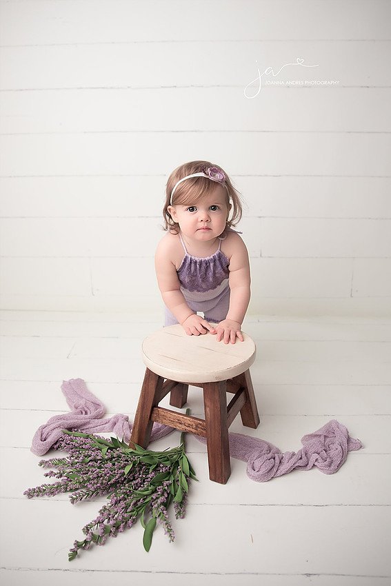 Baby Leaning on Stool