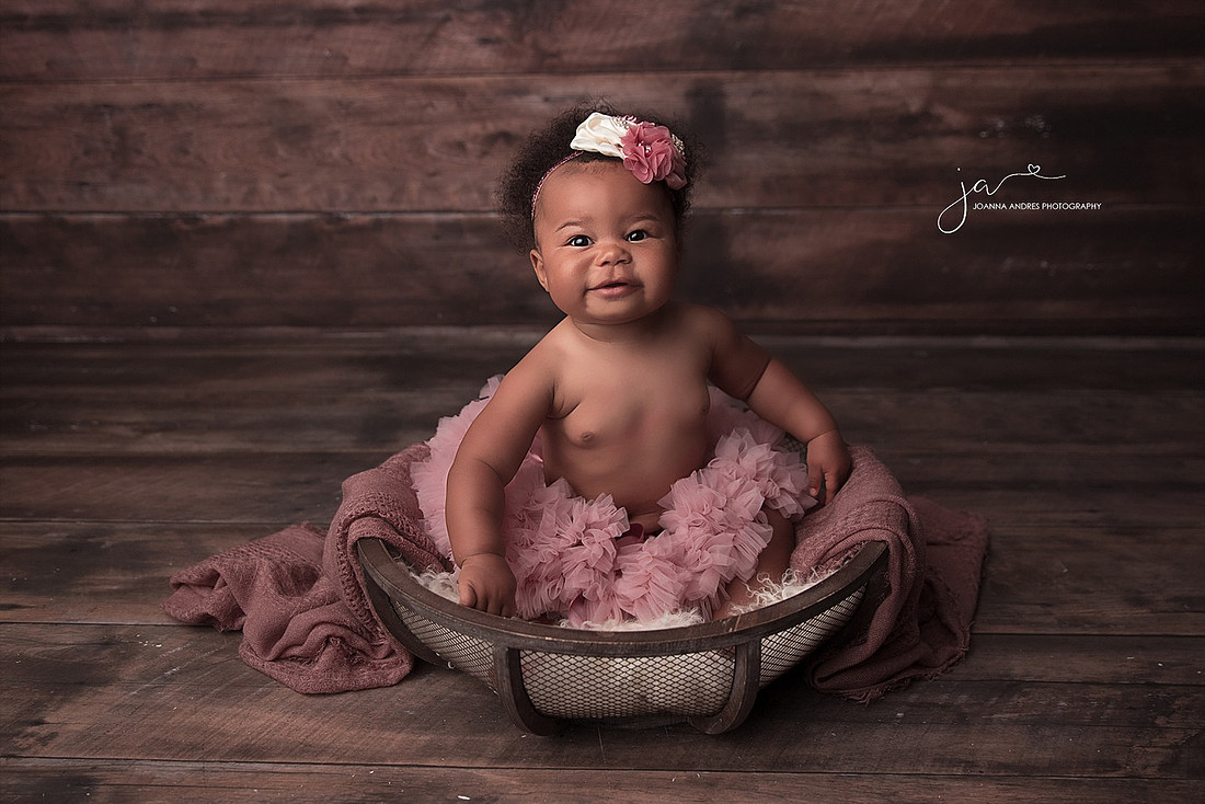 Baby Girl with tutu in a bucket