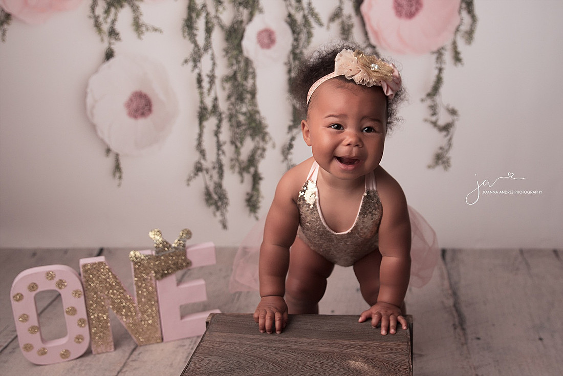 Happy Baby Girl Smiling for her one year portraits