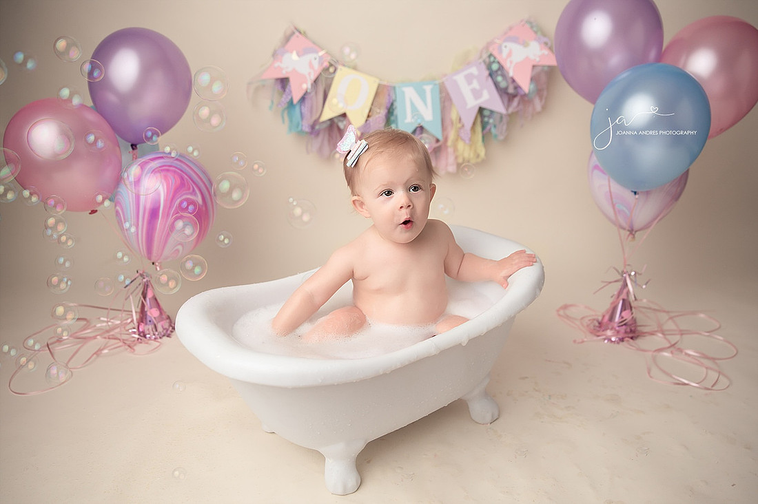Cute Expression of Baby in Bubble Bath