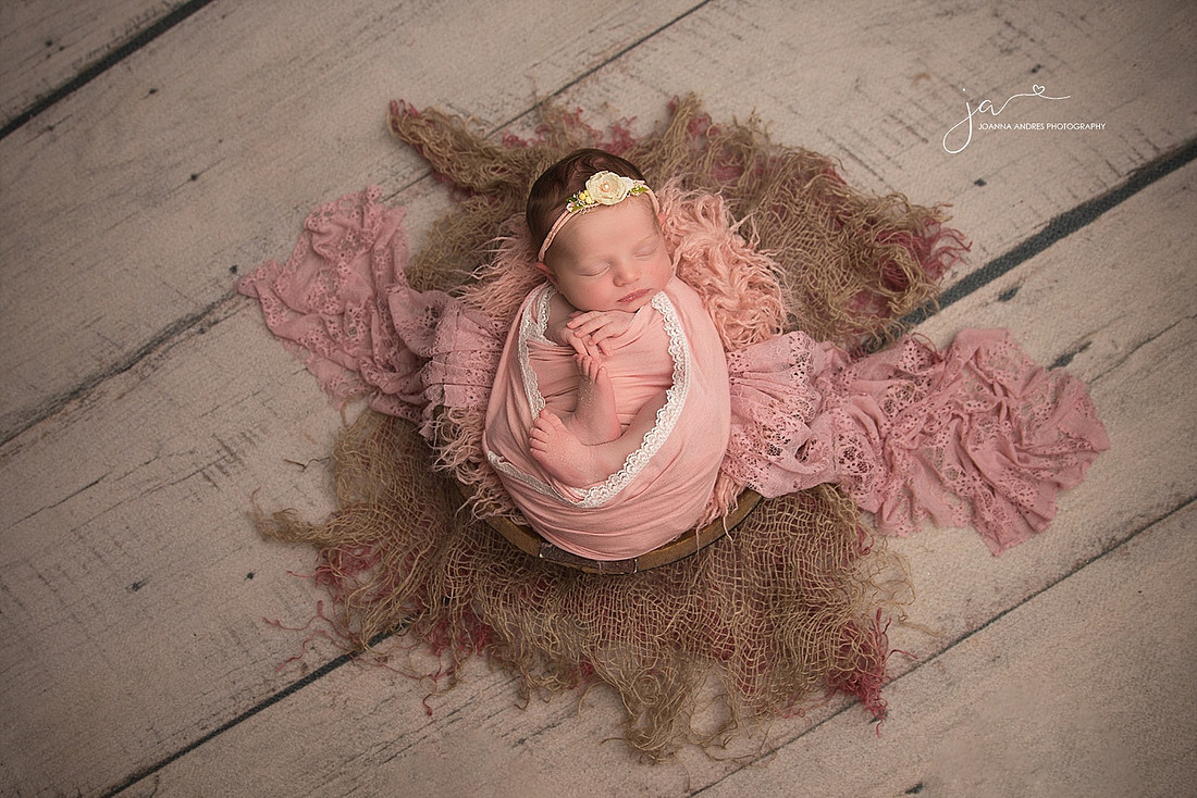 Baby Girl wrapped in pink