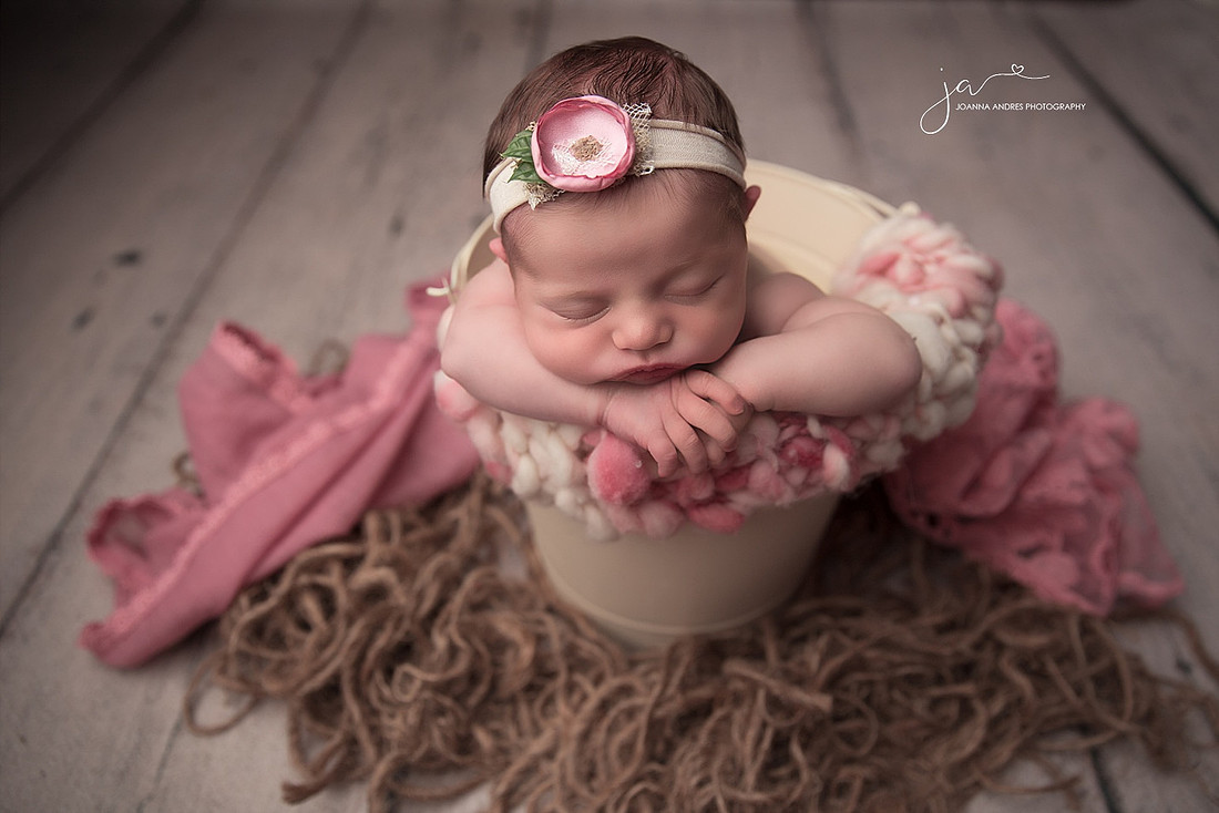 Baby in a bucket