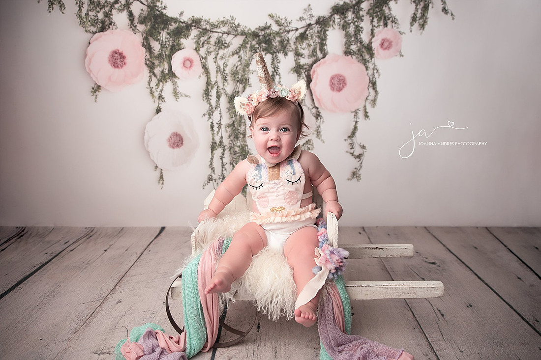 Baby in Unicorn Outfit