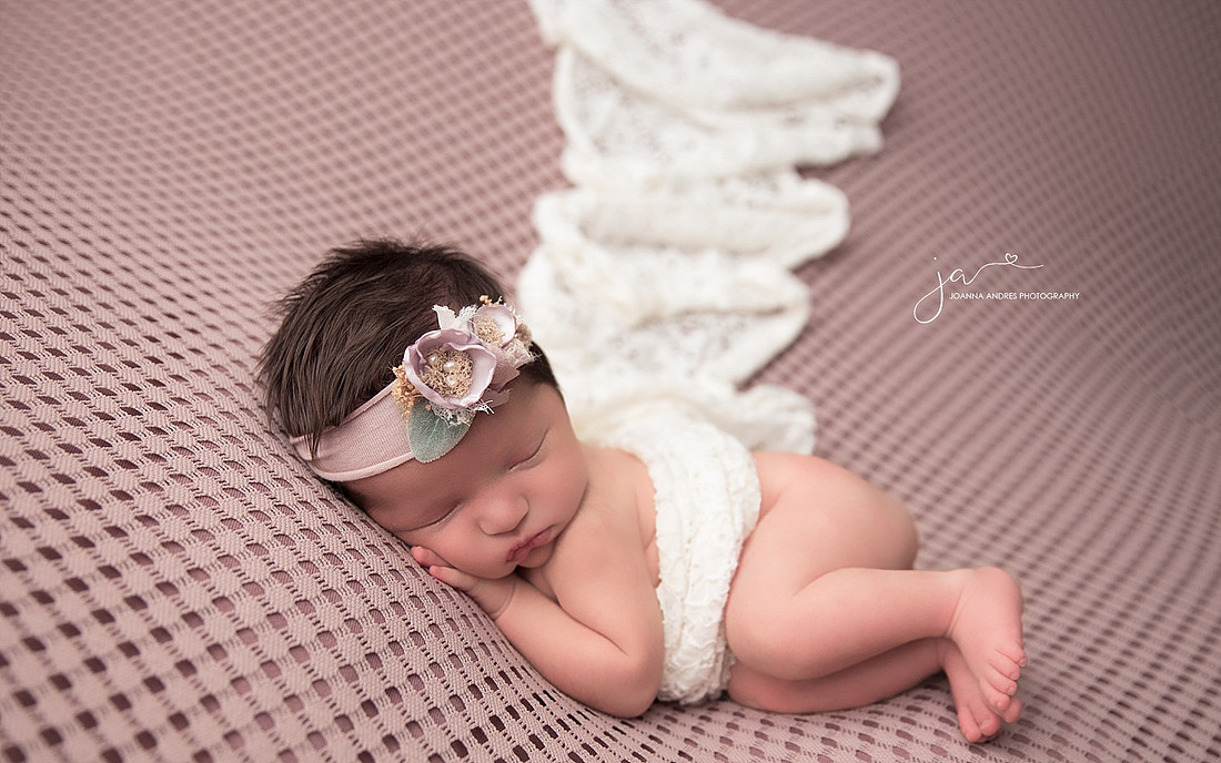 Side Laying POse with neutral blanket and mauve backdrop