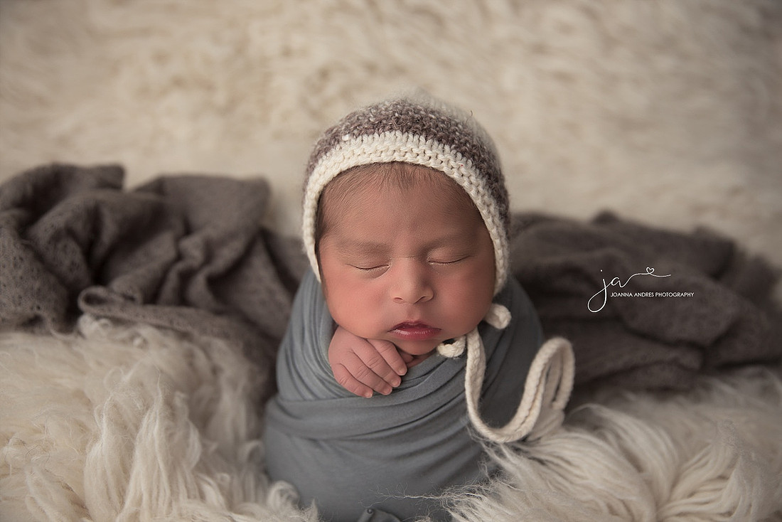 Baby Wrapped in Grays with White and Gray Bonnet