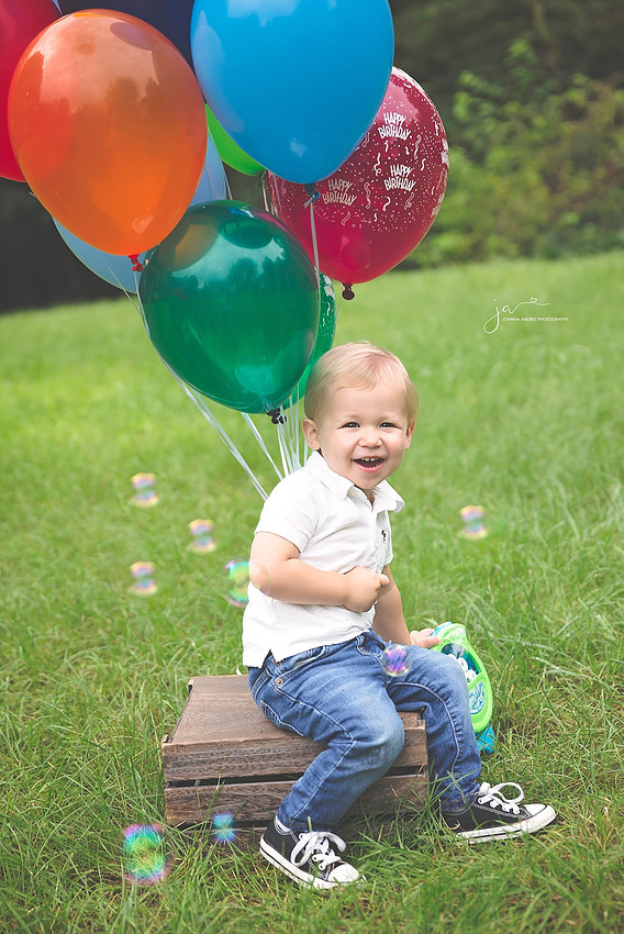 OUtdoor Session for two year old with balloons and bubbles
