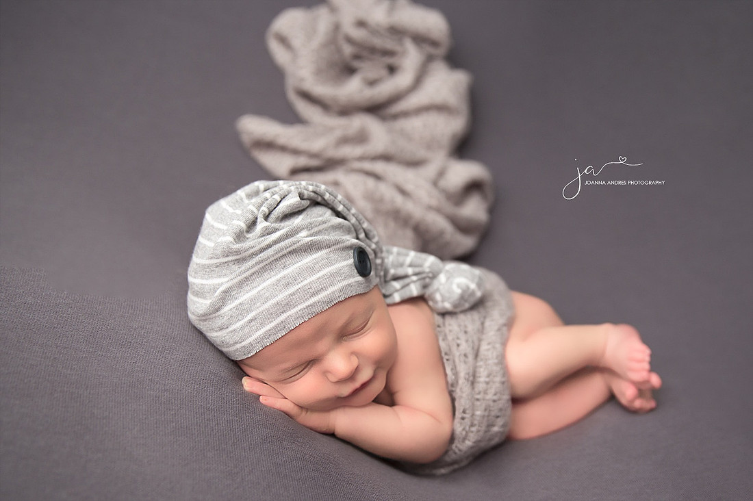 Side Laying Pose, Baby with blanket and gray and white hat