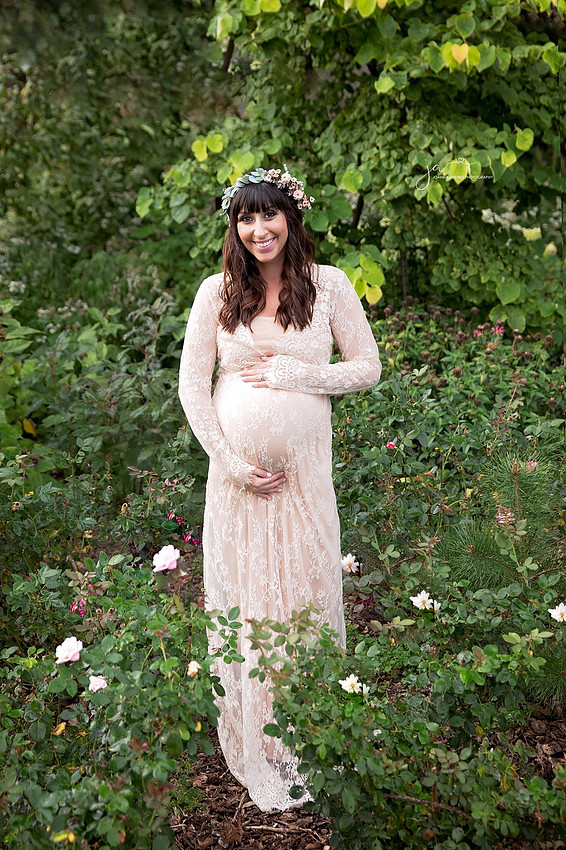 Maternity Session woman with lace dress and flower headband