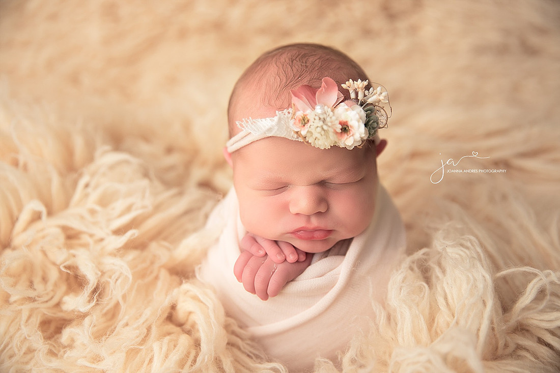 Baby wrapped up Potato Sack Pose