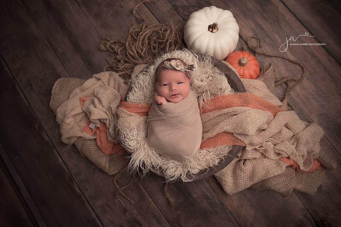 Baby with Pumpkins