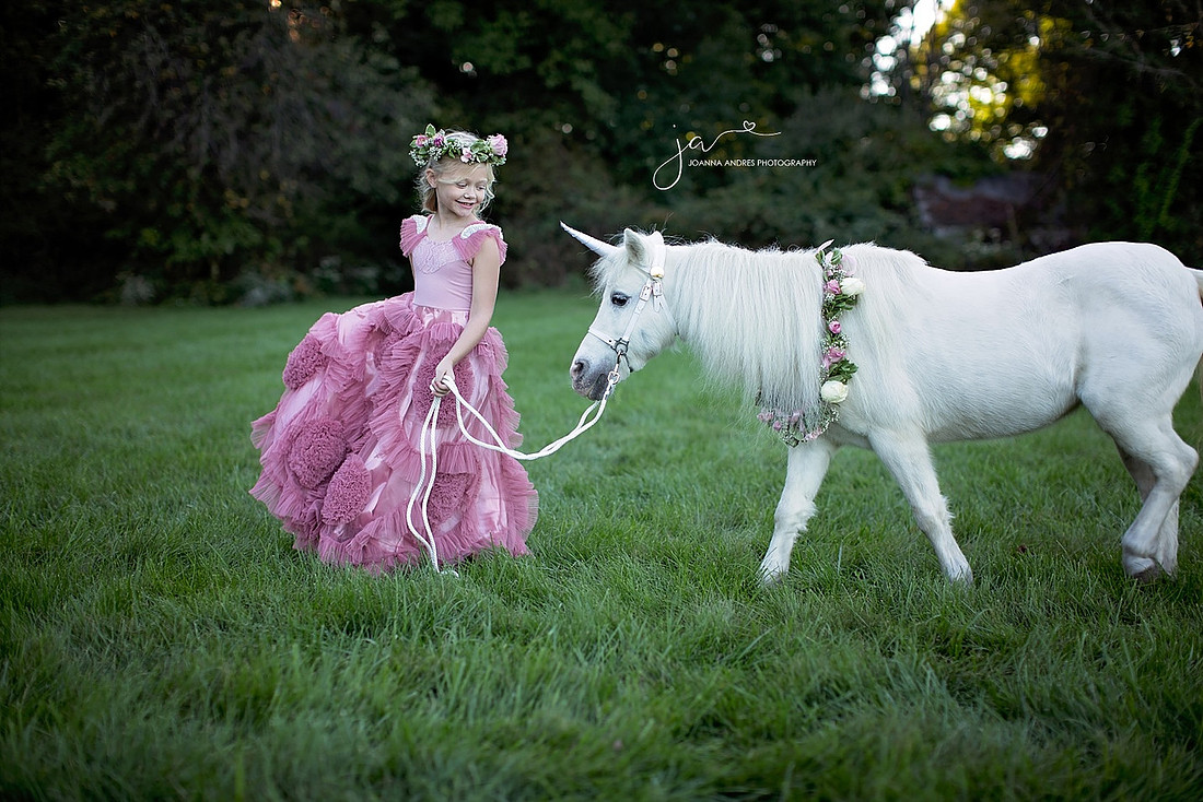 Girl taking Unicorn For a walk