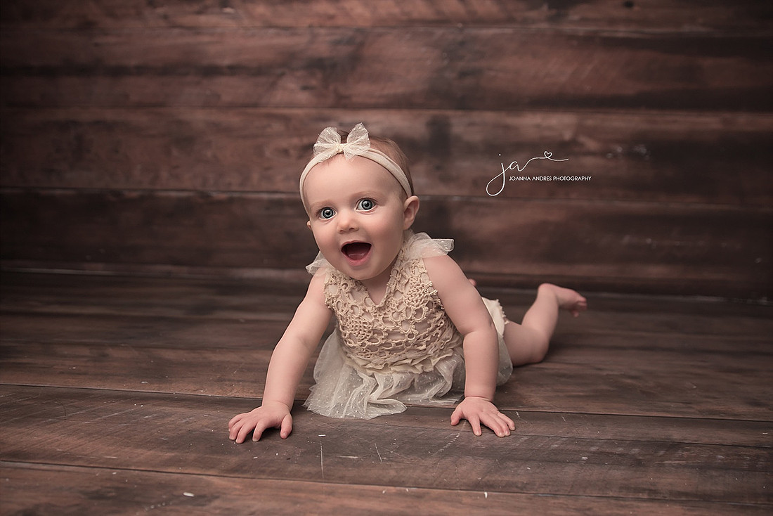 Baby SMiling Big laying on Belly with Neutrals
