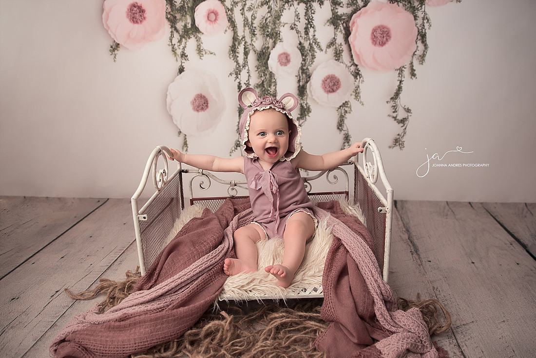 Baby Smiling Big On Bed Prop