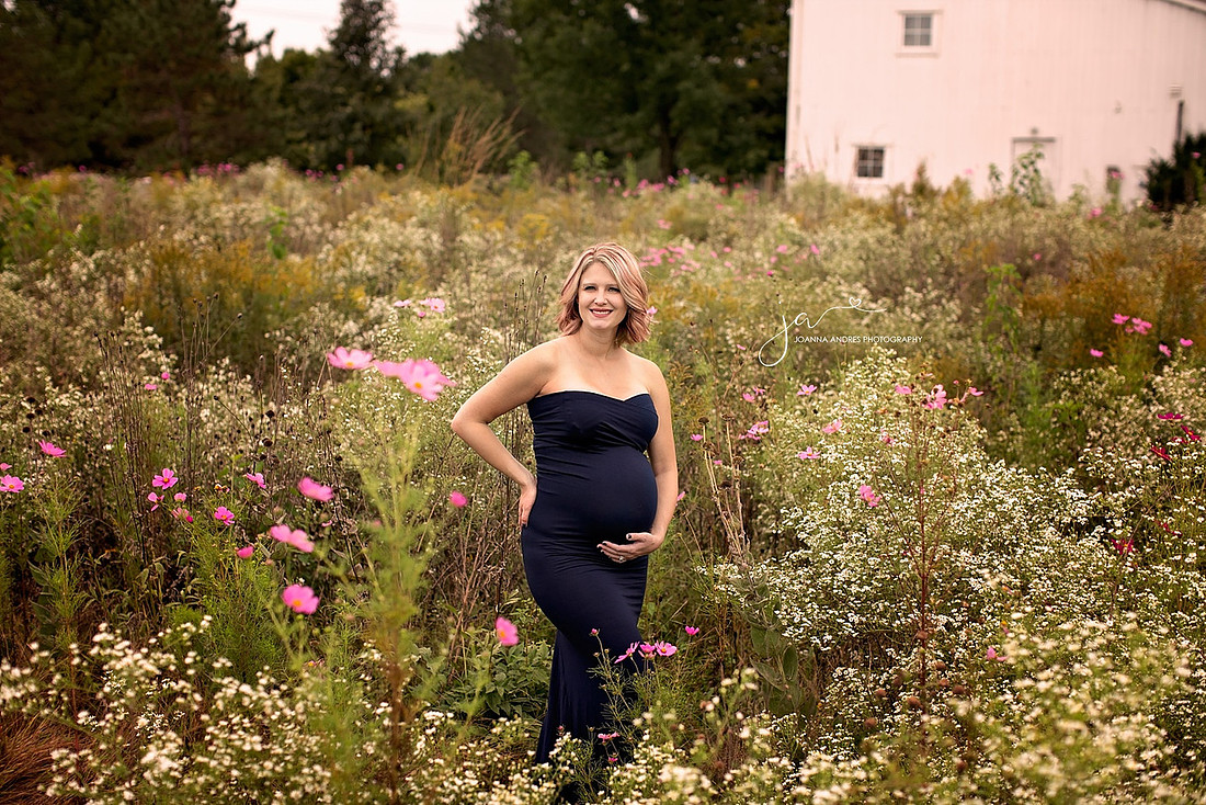 Gorgeous Maternity Photo in a field of wild flowers