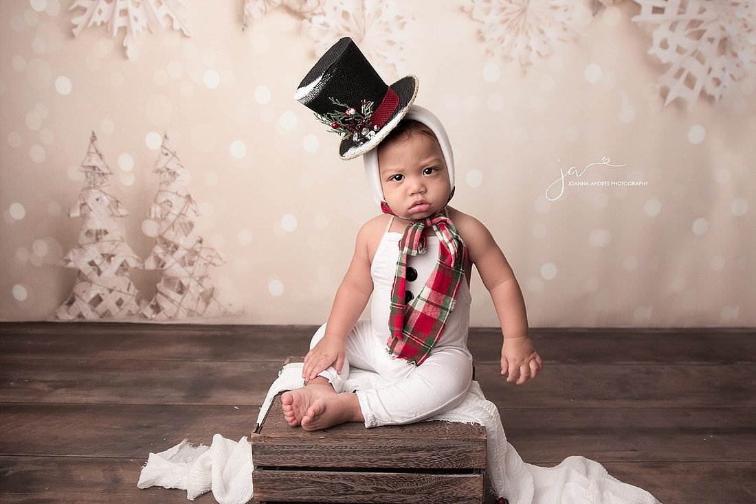 Adorable Baby Boy in a Snowman Outfit and Hat